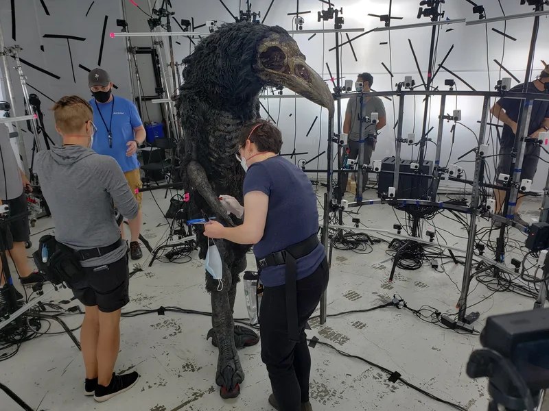 Camera crew working around the capture stage during the film shoot.