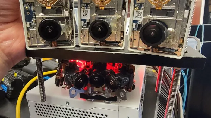 Three-camera Mobile Portrait prototype with exposed camera boards.