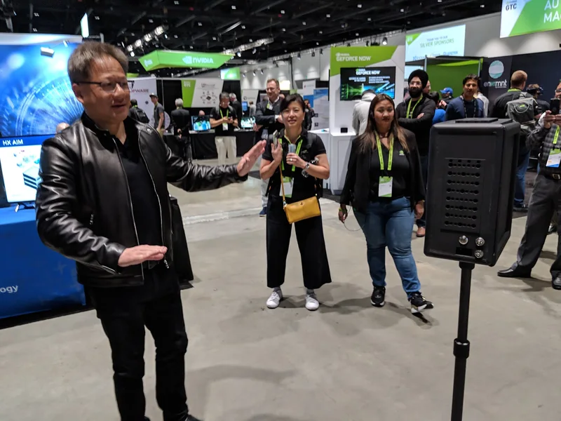 Alternate wide view of Jensen Huang and attendees watching the VCS demonstration.