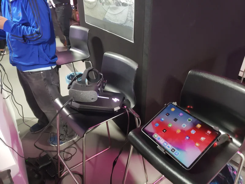 Close view of the tablet, VR headset and demo equipment at the partner booth.