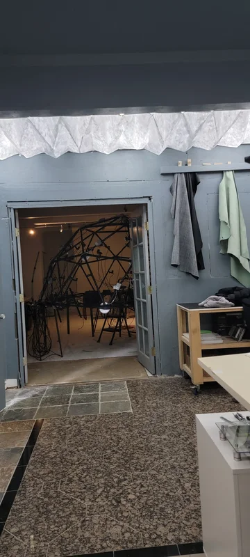 Capture studio entrance with rig visible inside.