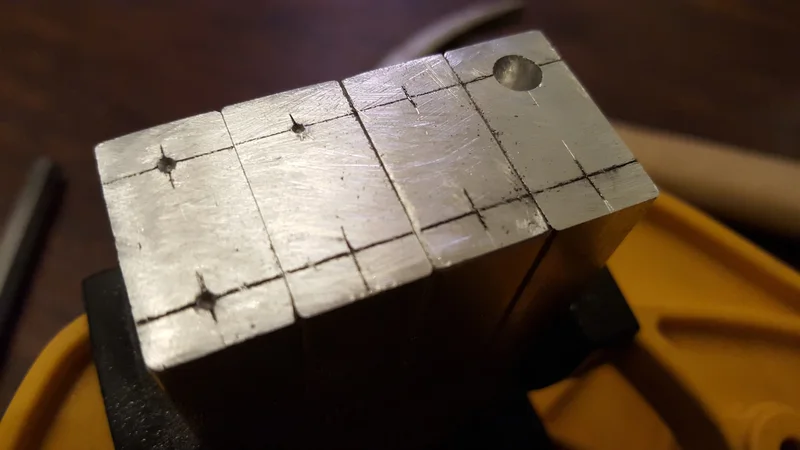 Measured metal component during fabrication.