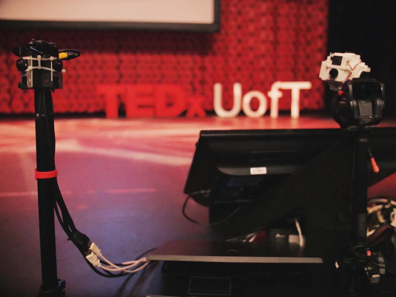 Custom cameras capturing a TEDxUofT stage for immersive video.