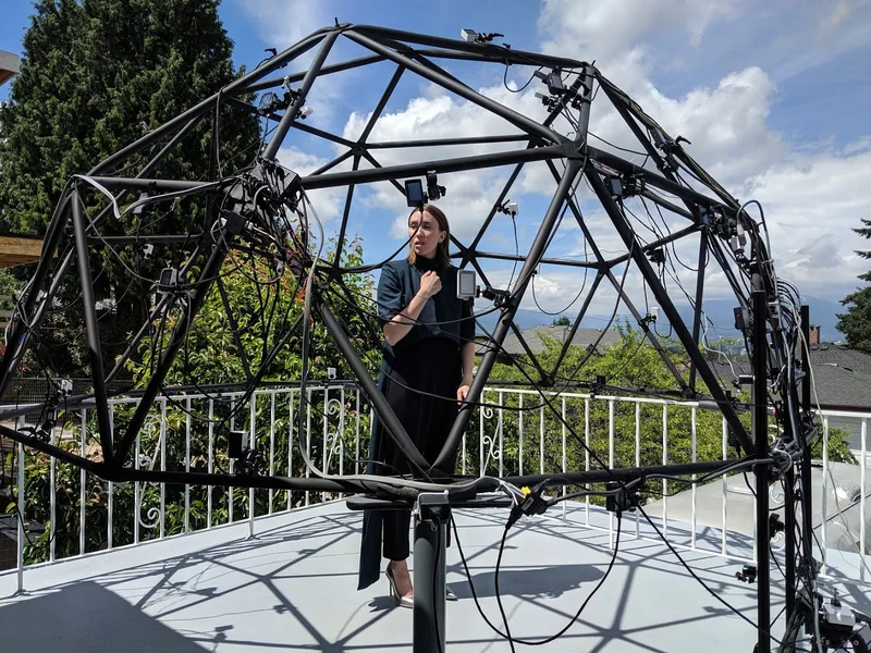 Alternate balcony dome rig angle with performer in black.