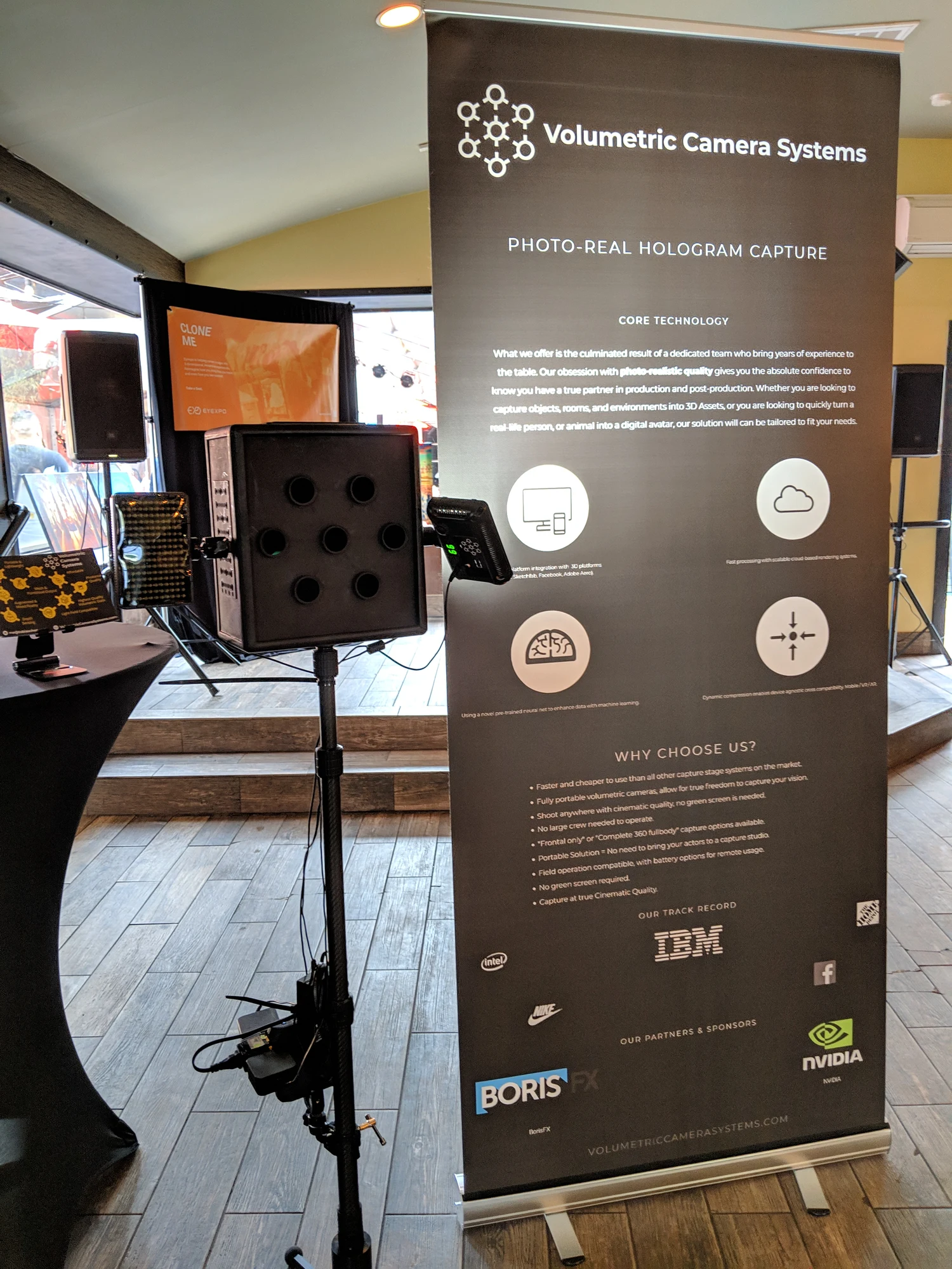 Compact VCS camera, screen and branded banner at the Canada House booth.