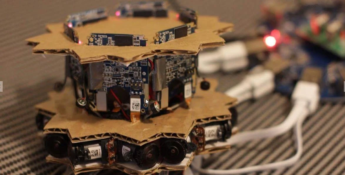 Compact multi-camera cardboard ring prototype.