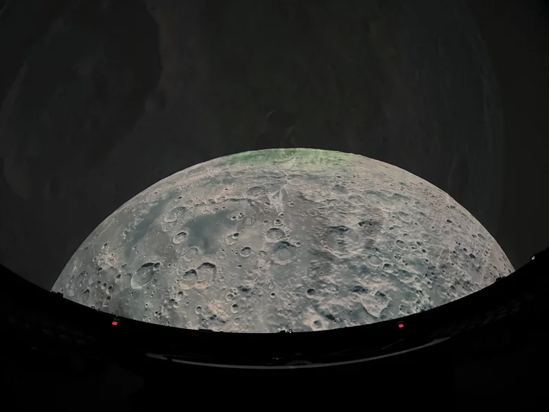Dome theatre displaying a moon surface.