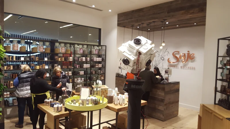 Yi camera deployment in an indoor shop/cafe setting; small gear visible.