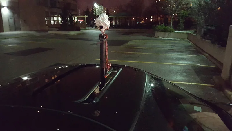 Camera rig mounted on vehicle roof for an outdoor deployment.