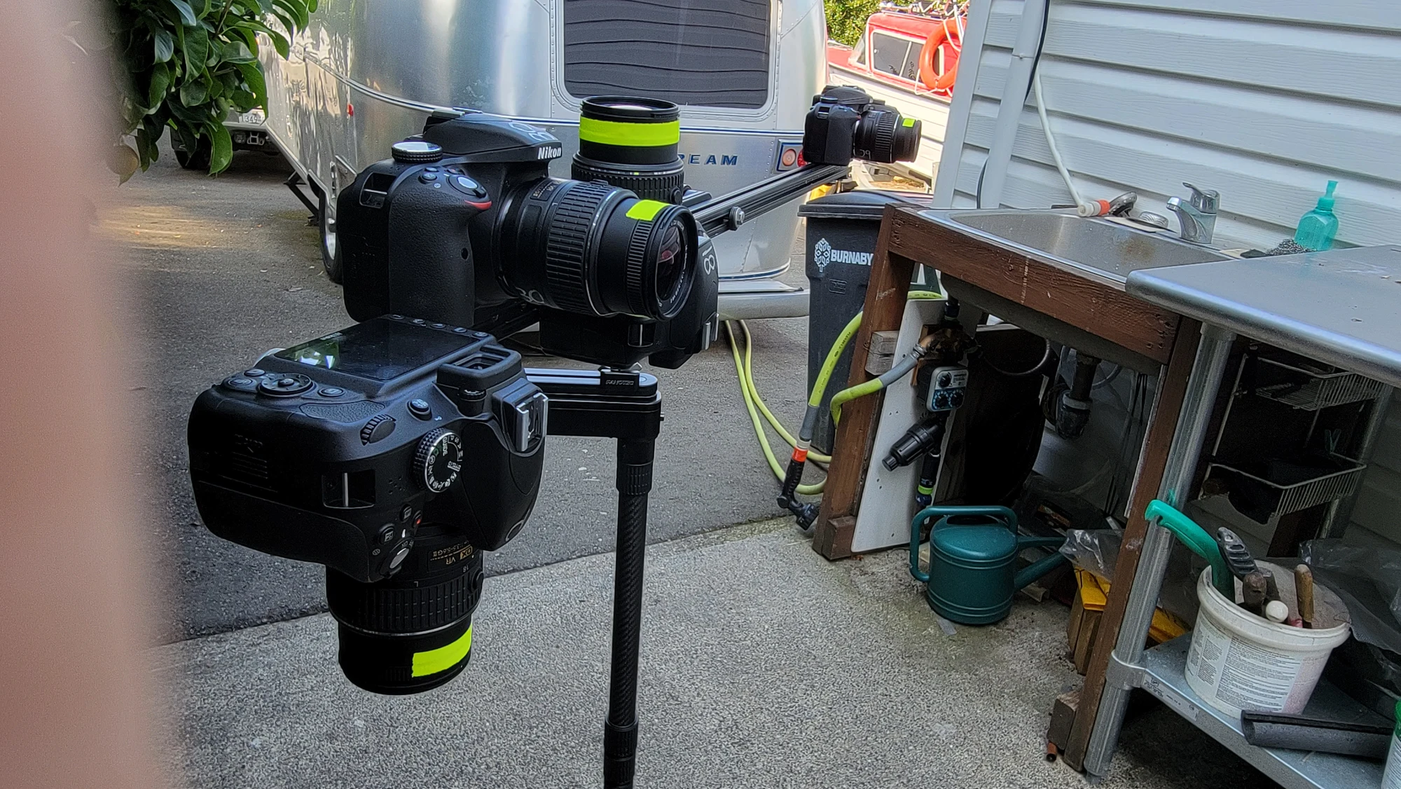 Close side view of two-camera custom capture rig.