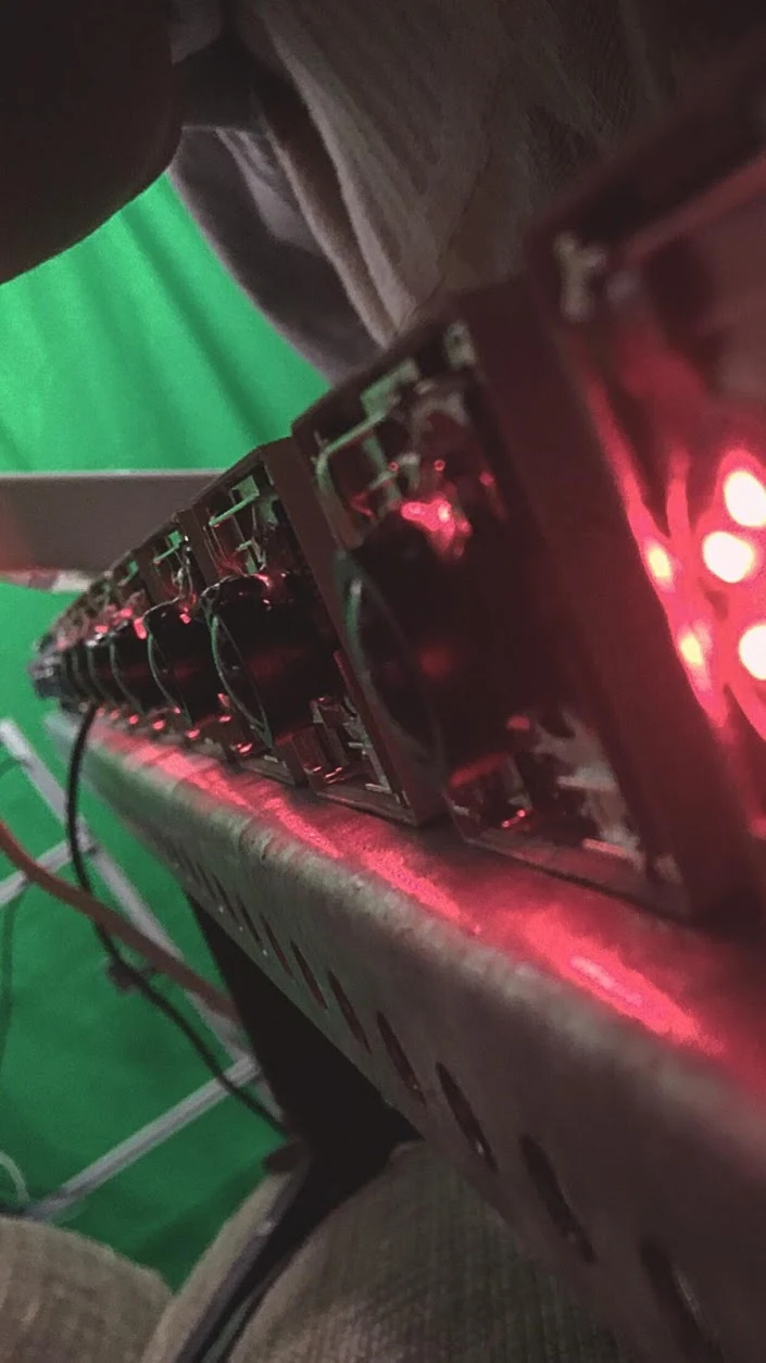 Close view of horizontal camera-array hardware at a capture installation.