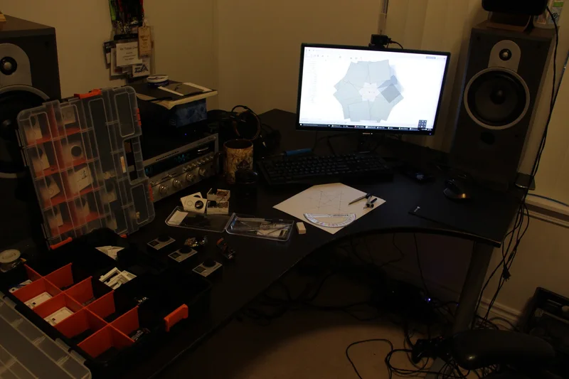 Home research workbench and camera design display.