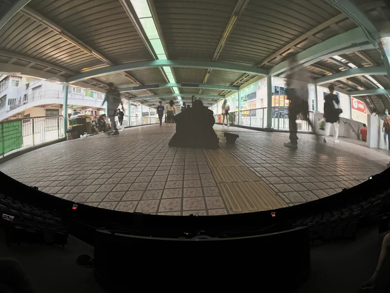 Dome theatre displaying a station/city video.
